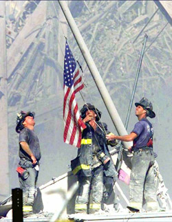 9-11 Firemen Raise Flag